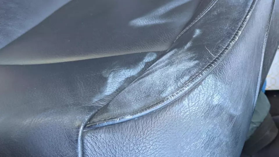 sunscreen on leather sofa
